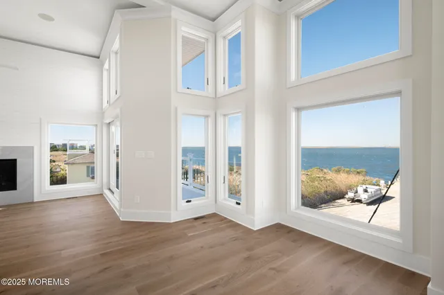 a bathroom with a shower sink and mirror