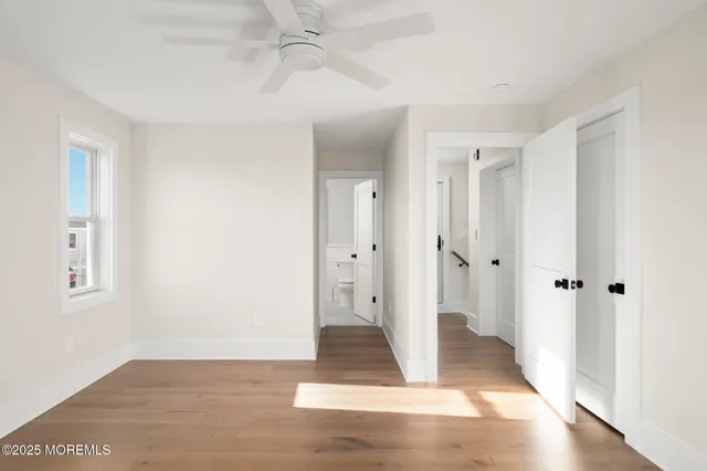 a view of a bathroom with a glass door shower