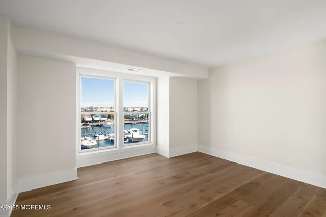 a view of a livingroom with wooden floor