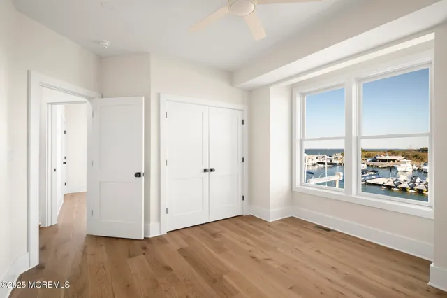 a view of a white building with ocean view