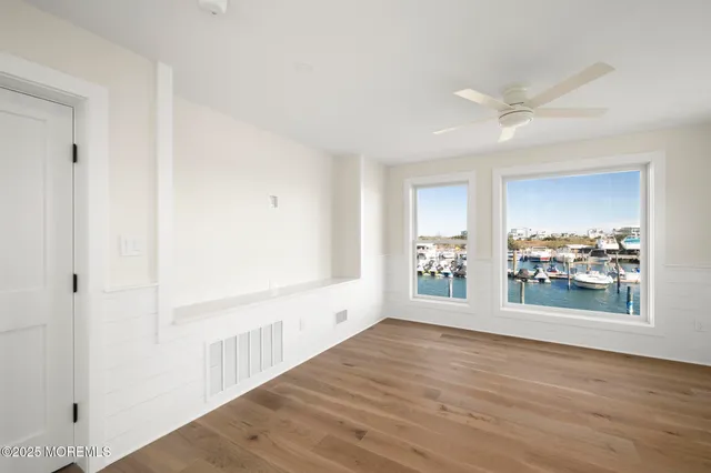 an aerial view of a house with a ocean view