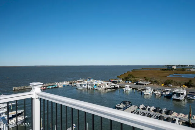 a view of a terrace with glass windows