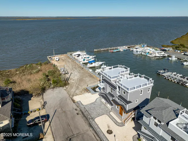 a view of a lake with a lot of trees all around