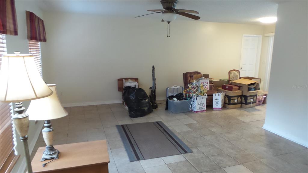 10127 Fox Squirrel Drive New Port Richey, FL 34654 - Photo 5 of 18 a view of a livingroom with furniture and a couch