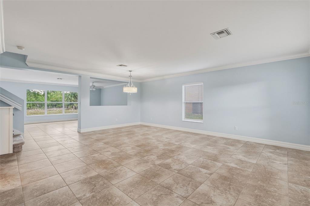 25134 Palisade Road Punta Gorda, FL 33983 - Photo 7 of 58 a view of an empty room with a window
