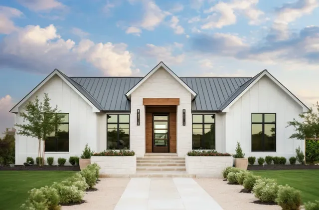 front view of a house with a yard