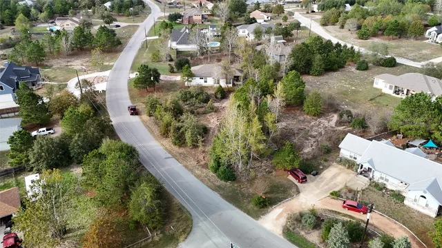 an aerial view of residential house with outdoor space