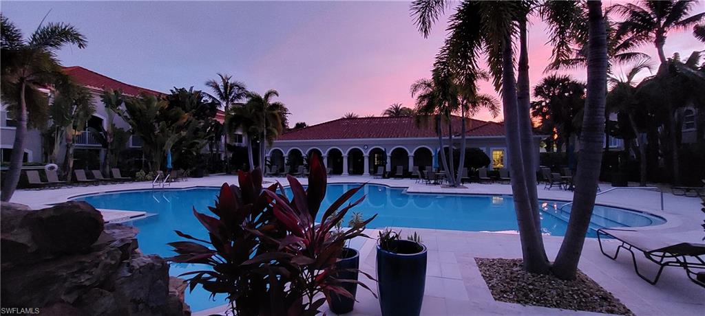 8561 Violeta Street, Unit 202 Estero, FL 34135 - Photo 2 of 40 a view of a house with backyard swimming pool