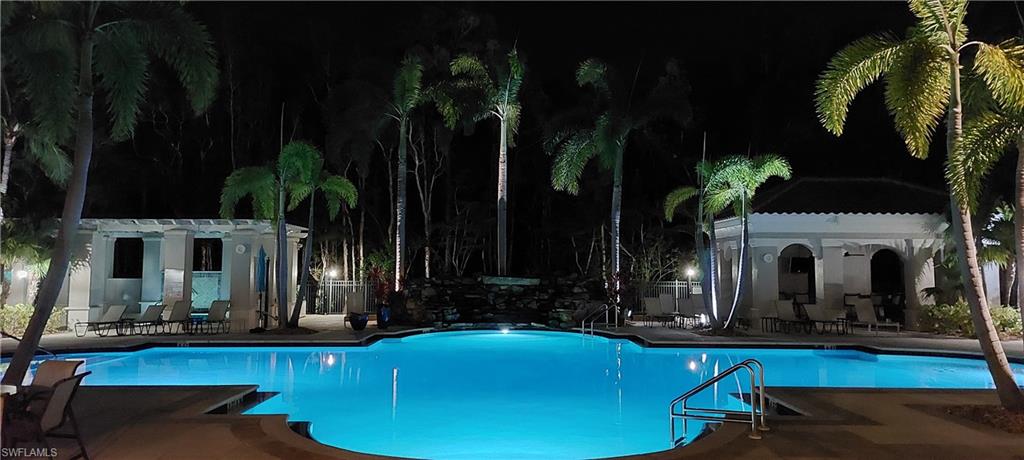 8561 Violeta Street, Unit 202 Estero, FL 34135 - Photo 32 of 40 a view of house with palm tree