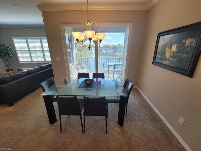 a view of deck with furniture and city view