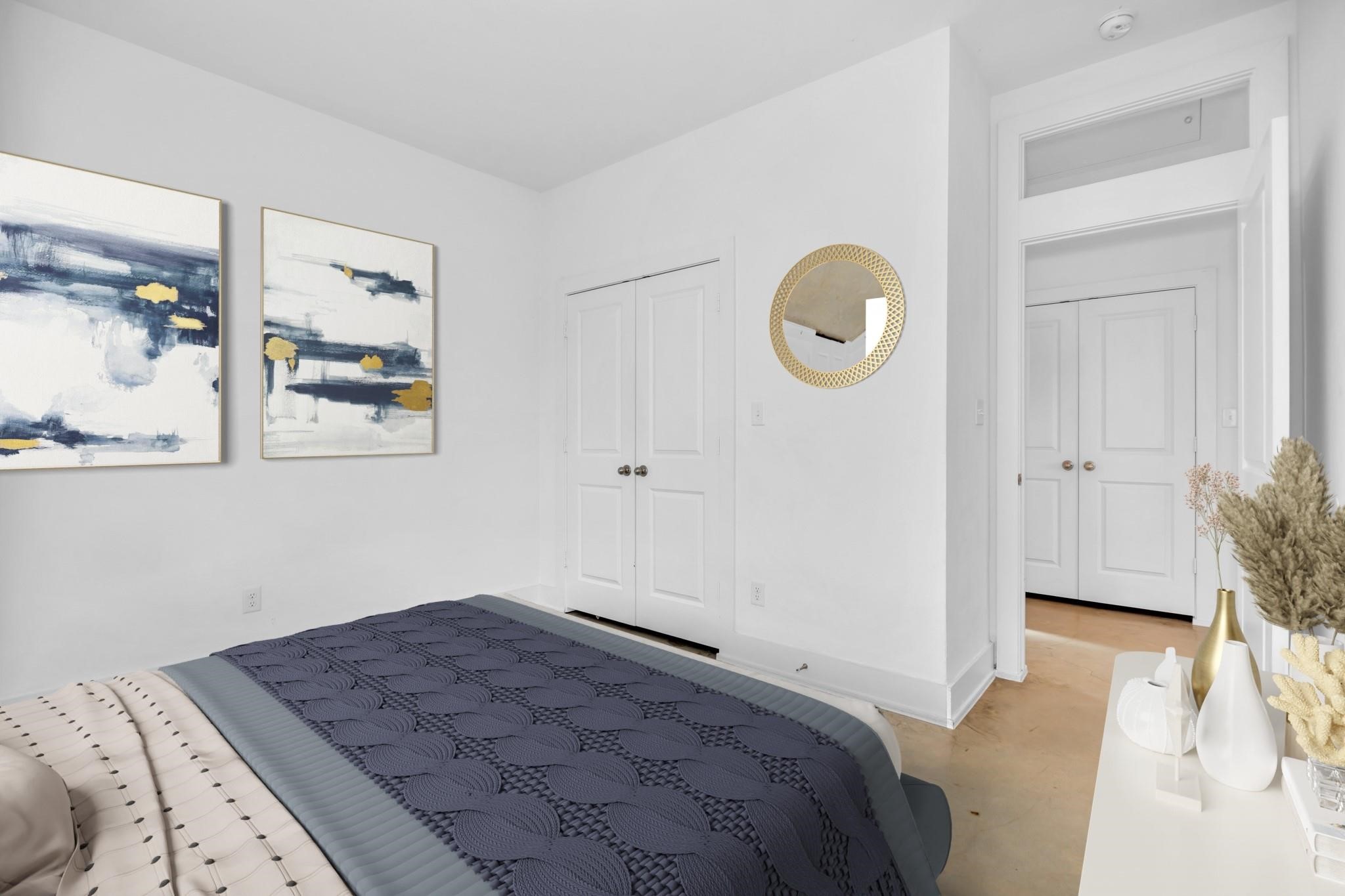 603 Edgewood Street, Unit B Houston, TX 77023 - Photo 8 of 16 Primary bedroom features soaring ceilings, expansive windows, and abundant natural light.