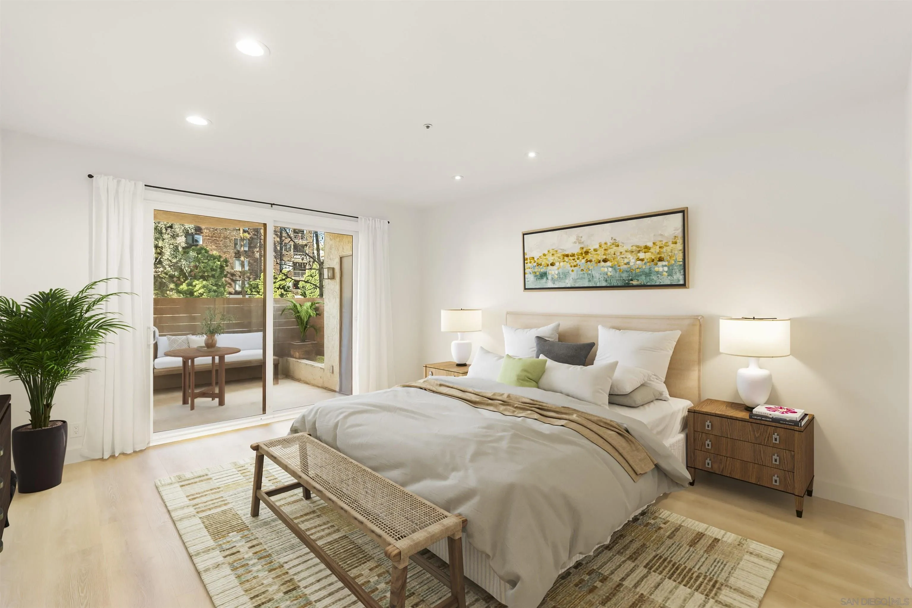 5805 Friars Road, Unit 2115 San Diego, CA 92110 - Photo 6 of 16 a bedroom with a large bed and a large window