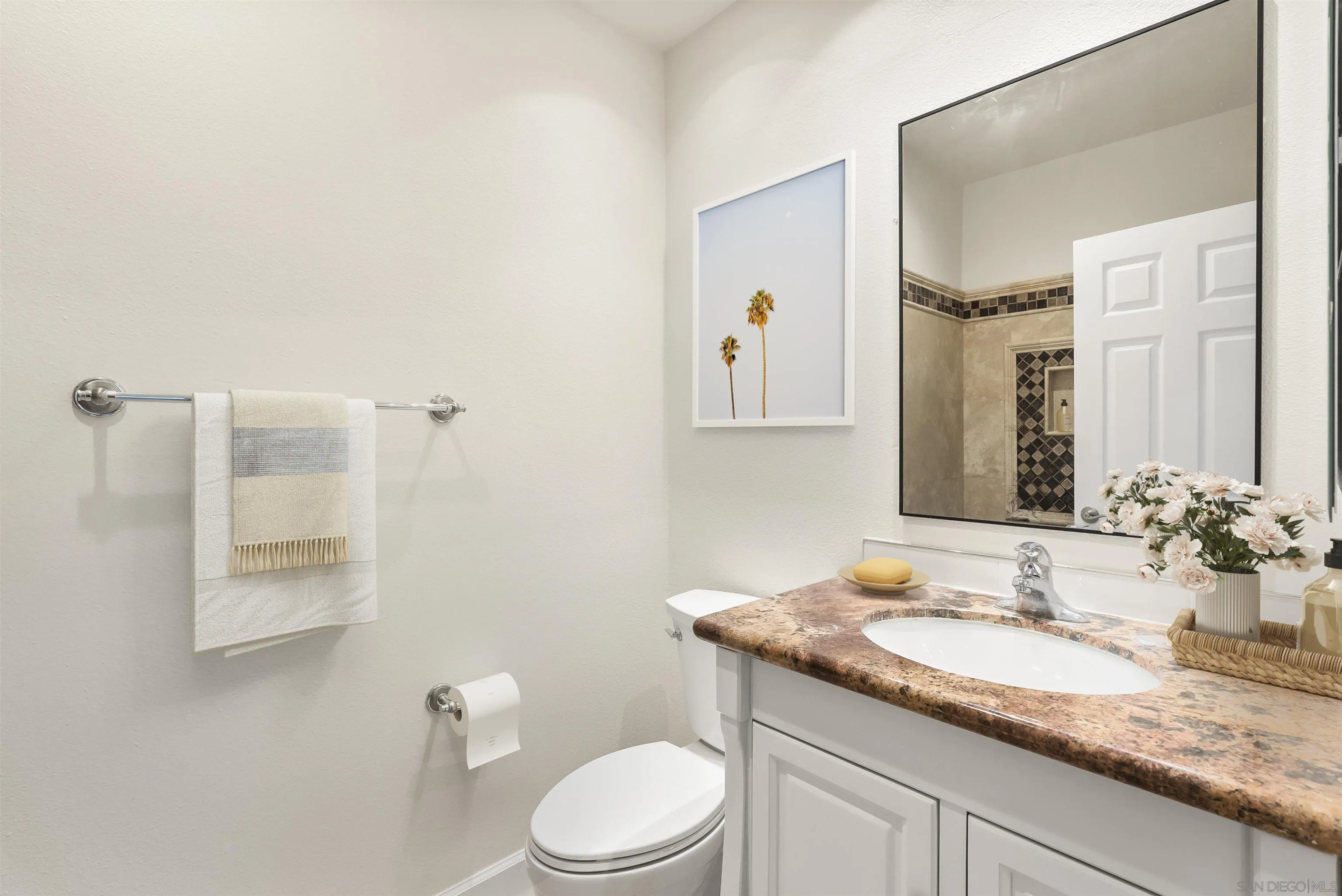 5805 Friars Road, Unit 2115 San Diego, CA 92110 - Photo 8 of 16 a bathroom with a granite countertop sink a toilet and a mirror