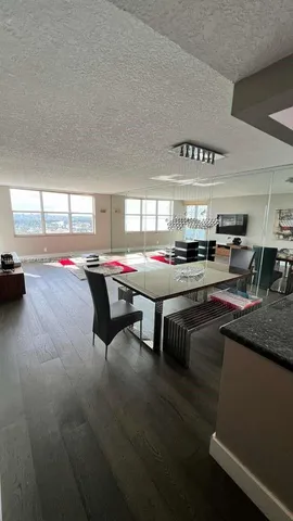 a outdoor space with lots of furniture and clutter