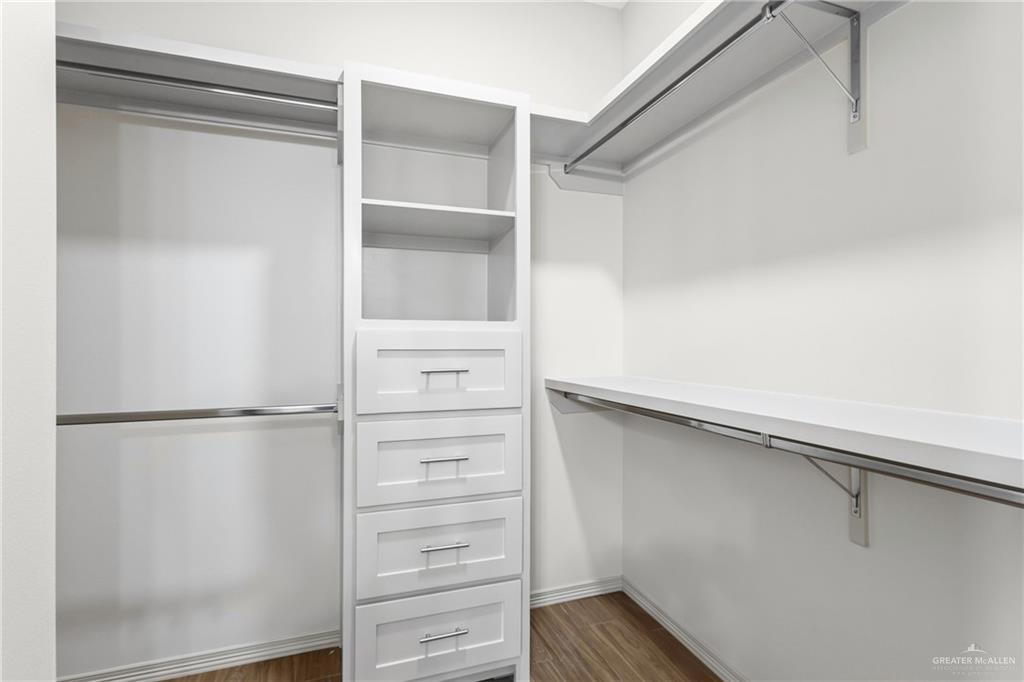2102 Trinity Street Donna, TX 78537 - Photo 11 of 24 a view of walk in closet with empty racks