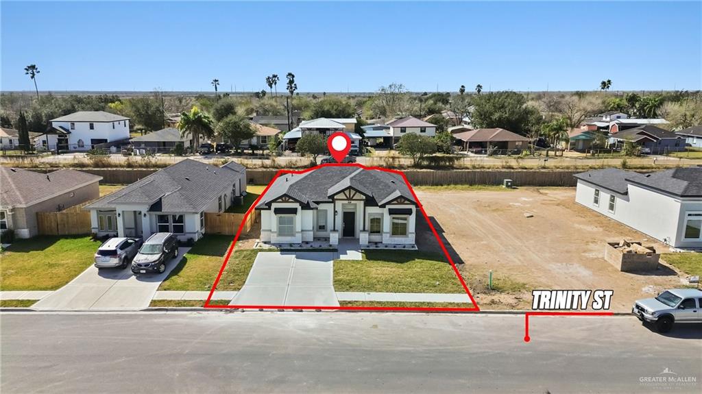 2102 Trinity Street Donna, TX 78537 - Photo 19 of 24 a view of houses with an outdoor space and lakeside