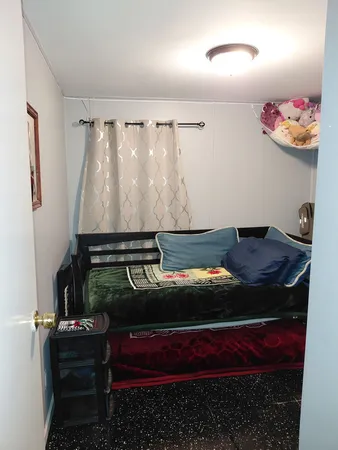 a room with furniture and rug