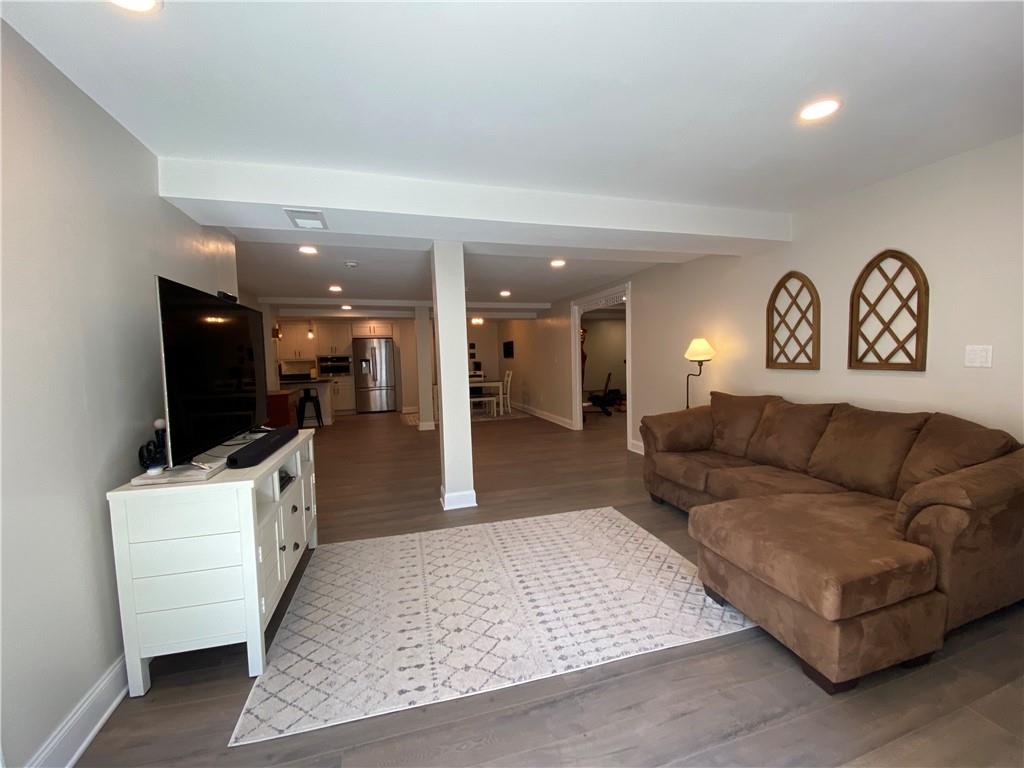 2300 Beallsville Road Marianna, PA 15345 - Photo 15 of 25 a living room with furniture and a flat screen tv