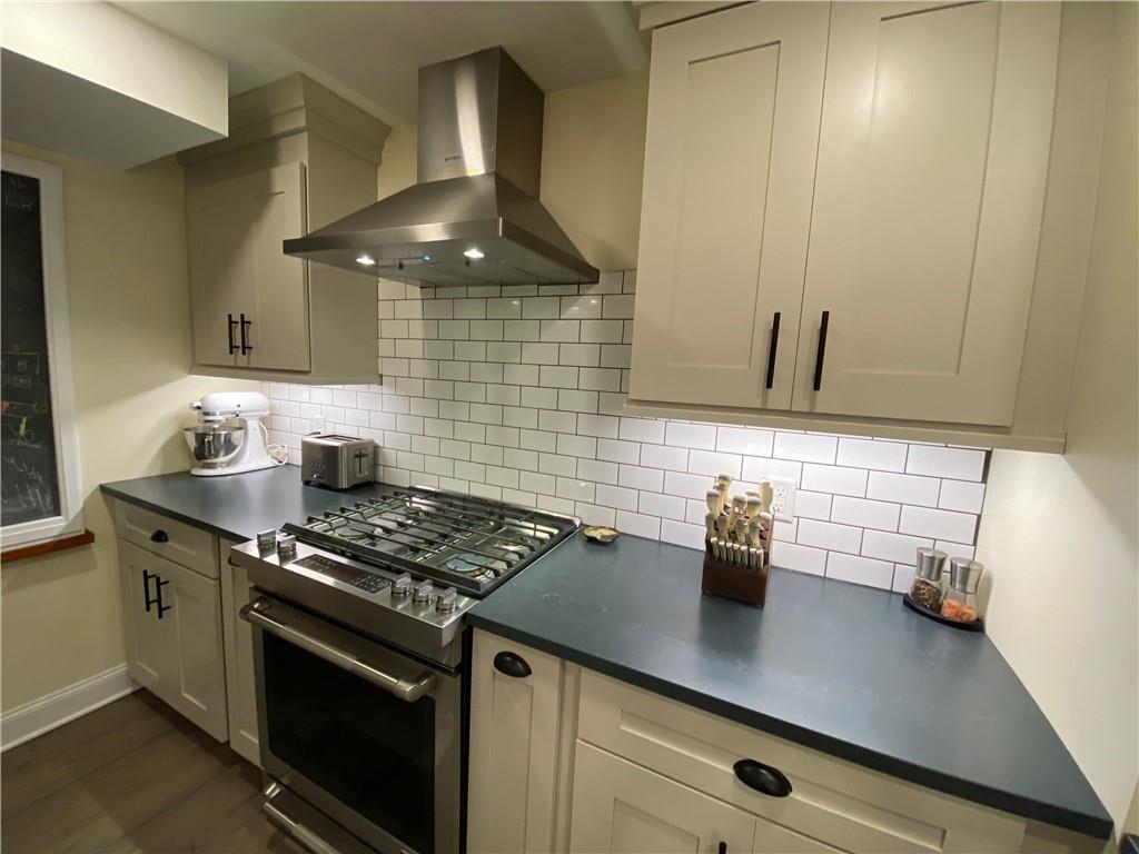 2300 Beallsville Road Marianna, PA 15345 - Photo 6 of 25 a kitchen with stainless steel appliances a stove and a cabinets