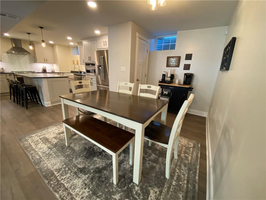 2300 Beallsville Road Marianna, PA 15345 - Photo 7 of 25 a kitchen with kitchen island a table and chairs in it