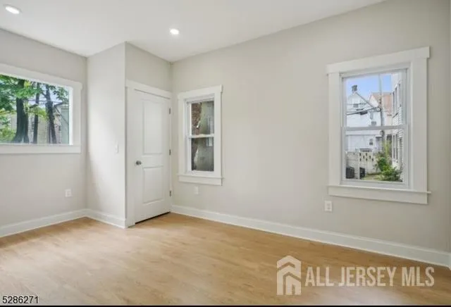 an empty room with windows