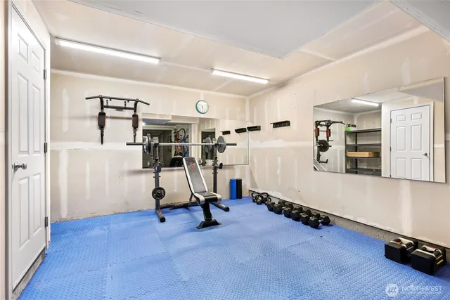 a view of a room with gym equipment