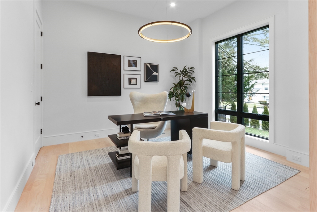 189 Hartman Road Newton, MA 02459 - Photo 11 of 38 a view of a dining room with furniture and wooden floor