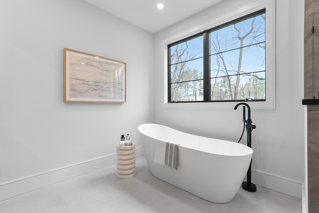 189 Hartman Road Newton, MA 02459 - Photo 26 of 38 a white tub sitting next to a window