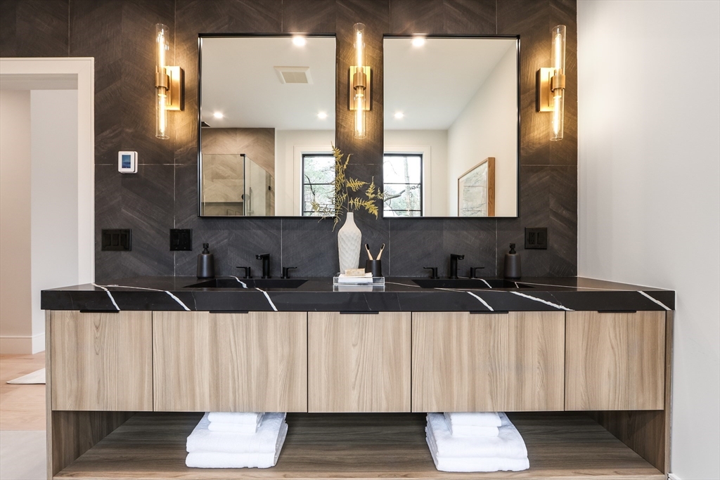 189 Hartman Road Newton, MA 02459 - Photo 27 of 38 a bathroom with a sink and a mirror