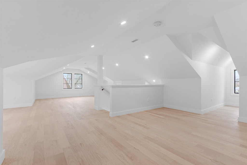 189 Hartman Road Newton, MA 02459 - Photo 29 of 38 an empty room with windows and and fireplace