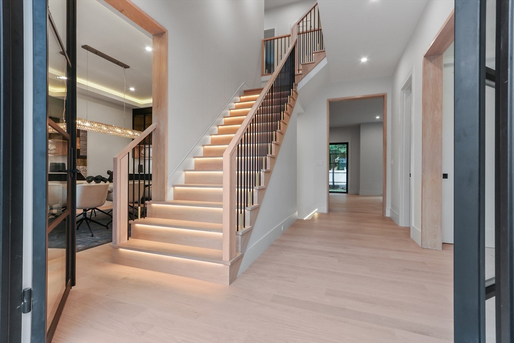 189 Hartman Road Newton, MA 02459 - Photo 34 of 38 a view of an entryway with wooden floor and windows