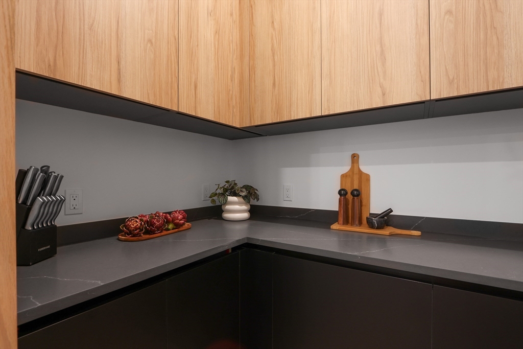 189 Hartman Road Newton, MA 02459 - Photo 5 of 38 a kitchen with a sink cabinets and appliances