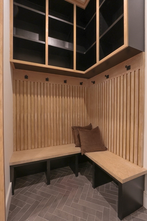 189 Hartman Road Newton, MA 02459 - Photo 10 of 38 a sitting area with wooden bench