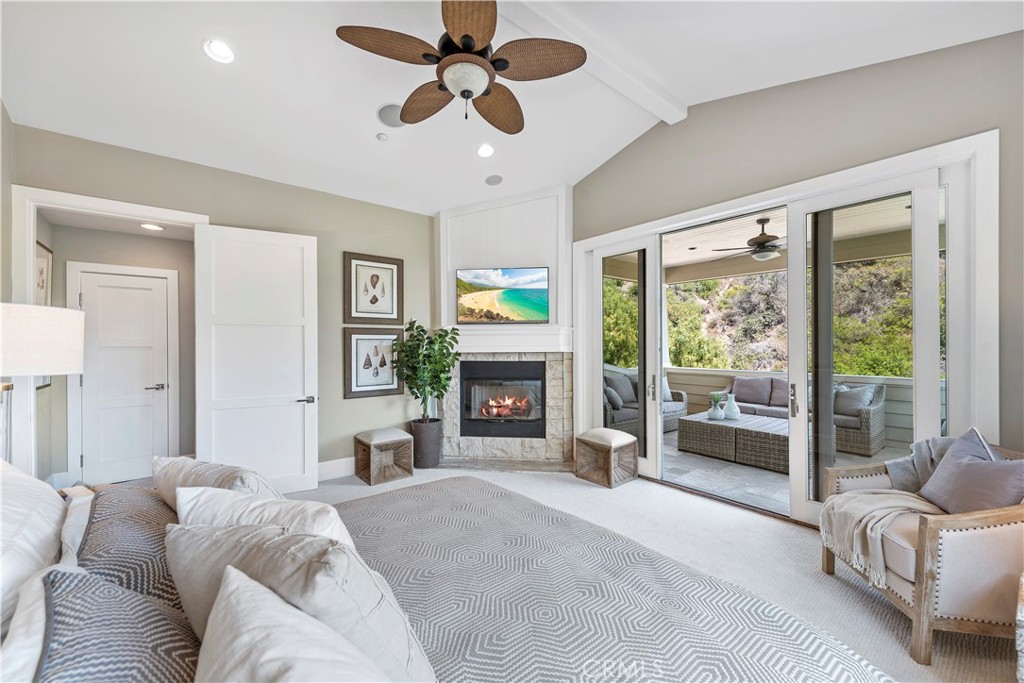 1339 Dunning Drive Laguna Beach, CA 92651 - Photo 11 of 42 a living room with furniture and a fireplace