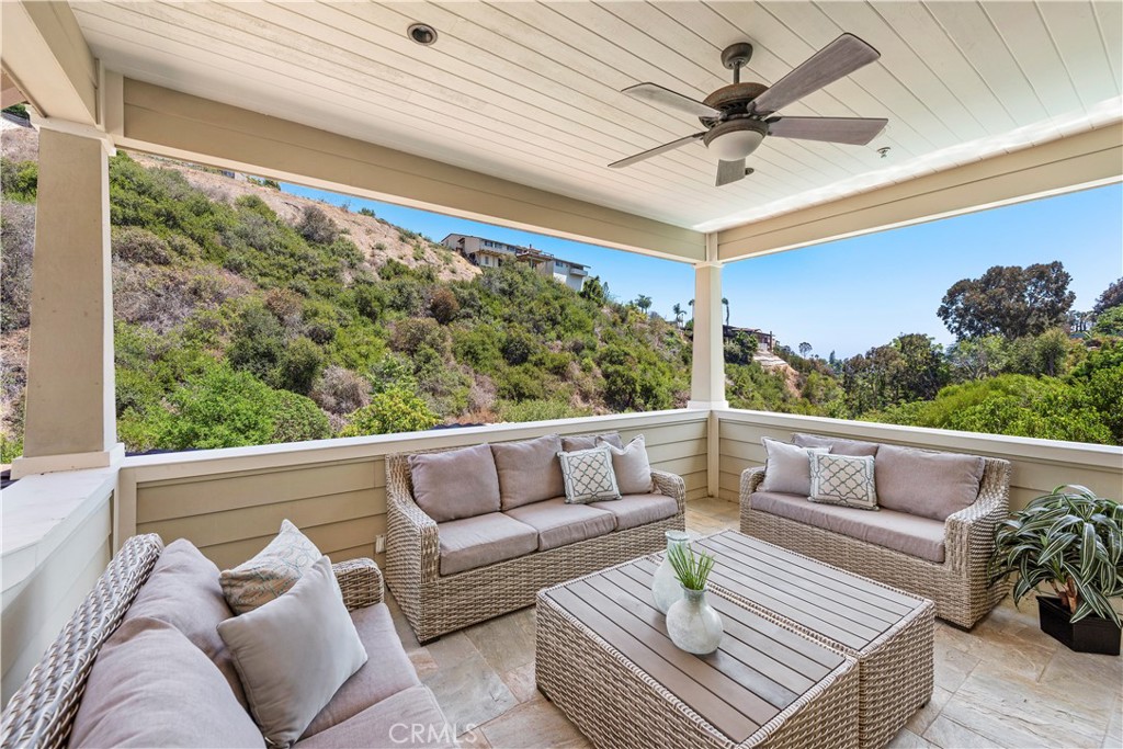 1339 Dunning Drive Laguna Beach, CA 92651 - Photo 12 of 42 a living room with furniture and a large window
