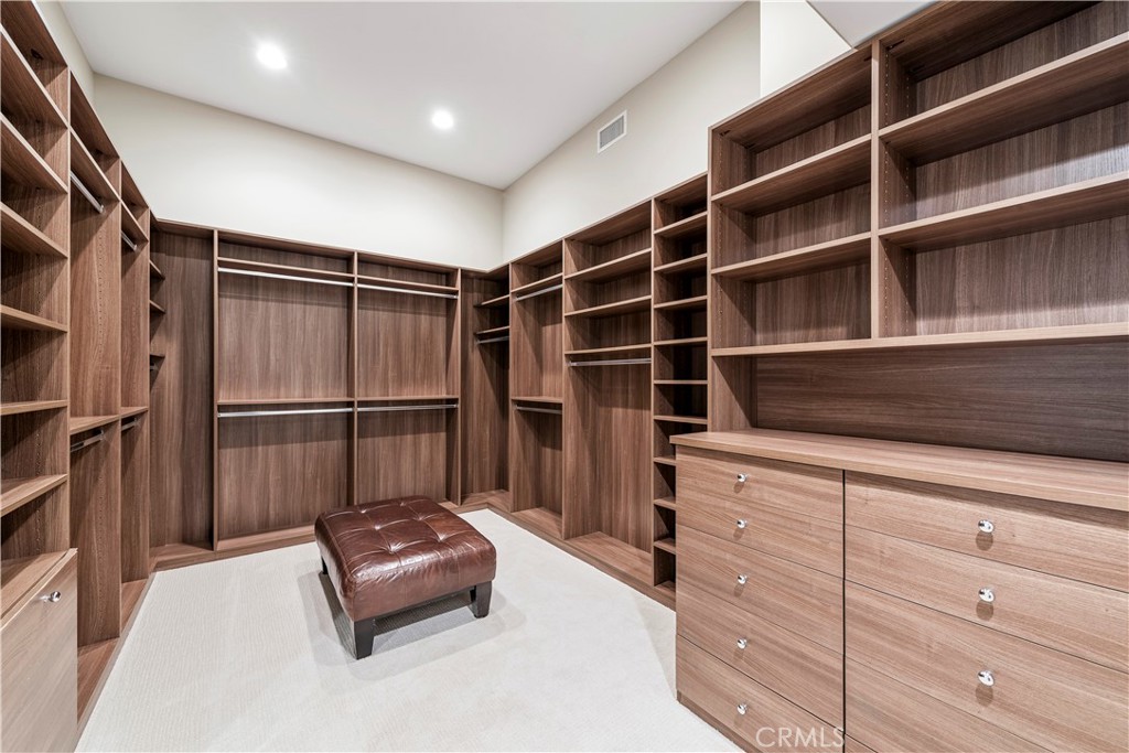 1339 Dunning Drive Laguna Beach, CA 92651 - Photo 13 of 42 a hallway with cabinets and wooden floor