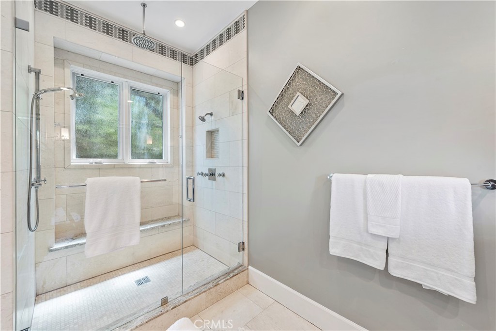 1339 Dunning Drive Laguna Beach, CA 92651 - Photo 15 of 42 a view of a bathroom with tub and shower