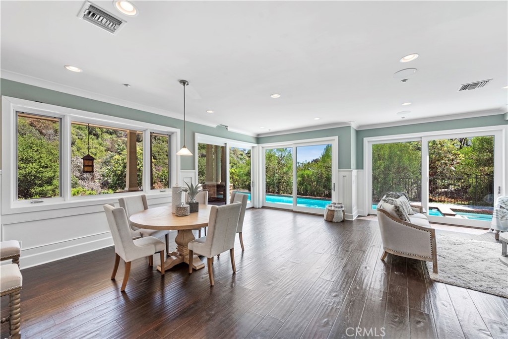 1339 Dunning Drive Laguna Beach, CA 92651 - Photo 17 of 42 a dining room with furniture window and wooden floor