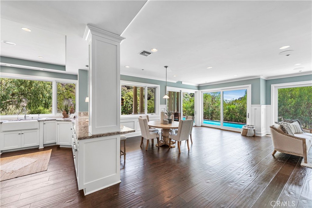 1339 Dunning Drive Laguna Beach, CA 92651 - Photo 18 of 42 a view of a dining room with furniture window and wooden floor