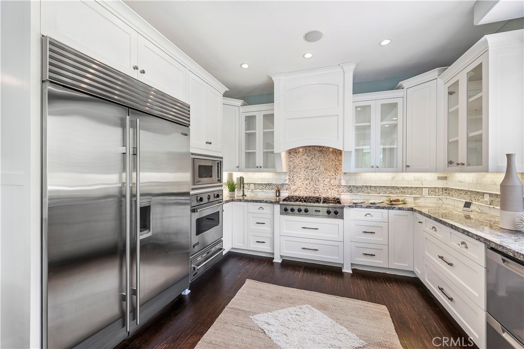 1339 Dunning Drive Laguna Beach, CA 92651 - Photo 21 of 42 a kitchen with granite countertop stainless steel appliances and sink