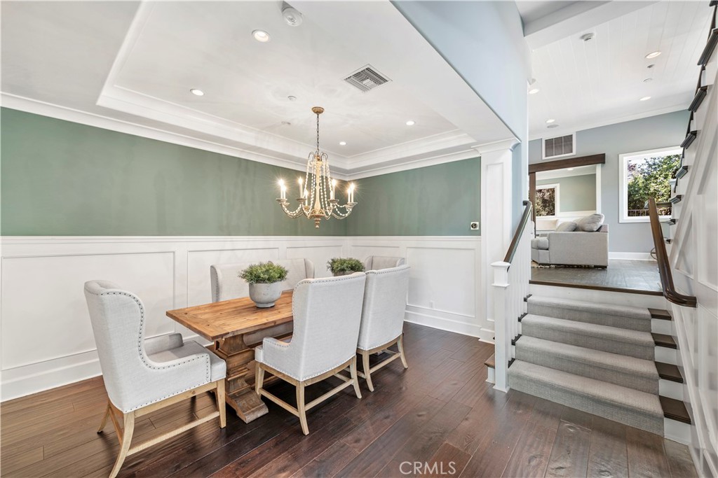 1339 Dunning Drive Laguna Beach, CA 92651 - Photo 25 of 42 a view of a dining room with furniture and wooden floor