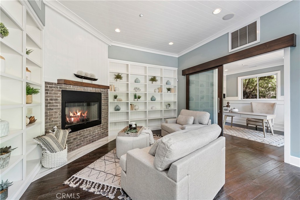 1339 Dunning Drive Laguna Beach, CA 92651 - Photo 27 of 42 a living room with furniture and a fireplace