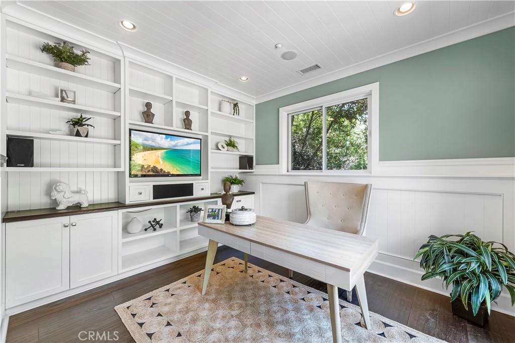 1339 Dunning Drive Laguna Beach, CA 92651 - Photo 28 of 42 a living room with furniture and a flat screen tv