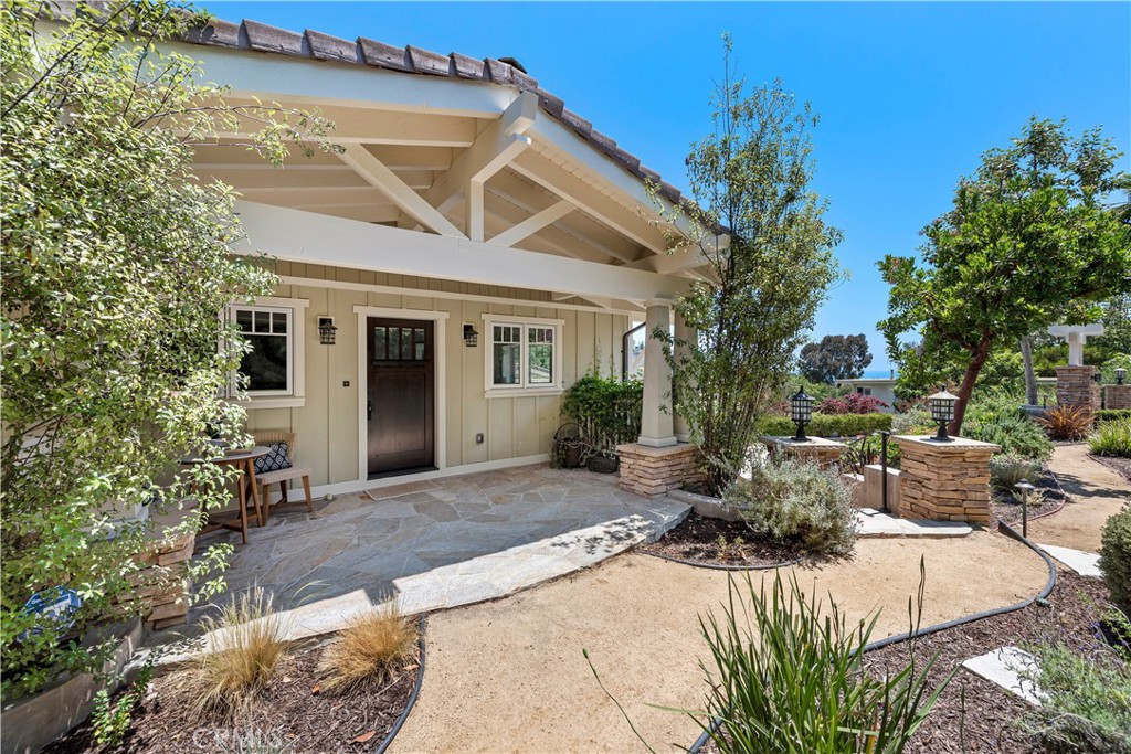 1339 Dunning Drive Laguna Beach, CA 92651 - Photo 35 of 42 a view of a patio with table and chairs and potted plants