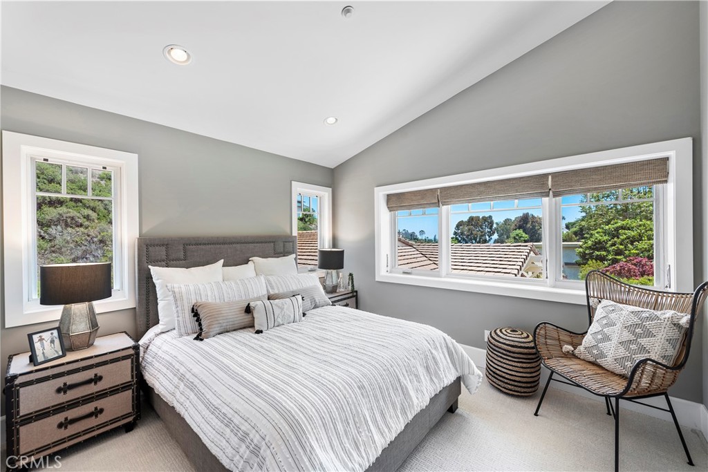 1339 Dunning Drive Laguna Beach, CA 92651 - Photo 41 of 42 a bedroom with a bed and a large window