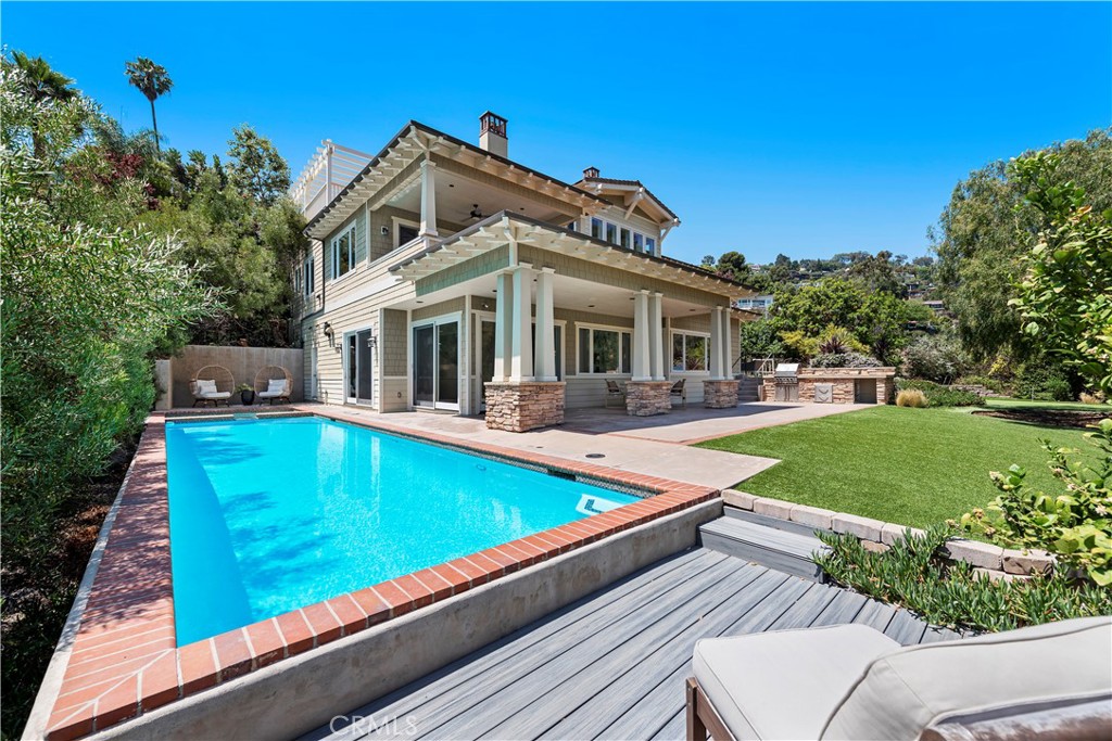 1339 Dunning Drive Laguna Beach, CA 92651 - Photo 9 of 42 a view of house with swimming pool outdoor seating
