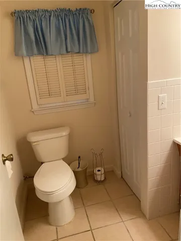 an empty room with a fireplace