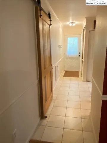 a bathroom with a glass door shower