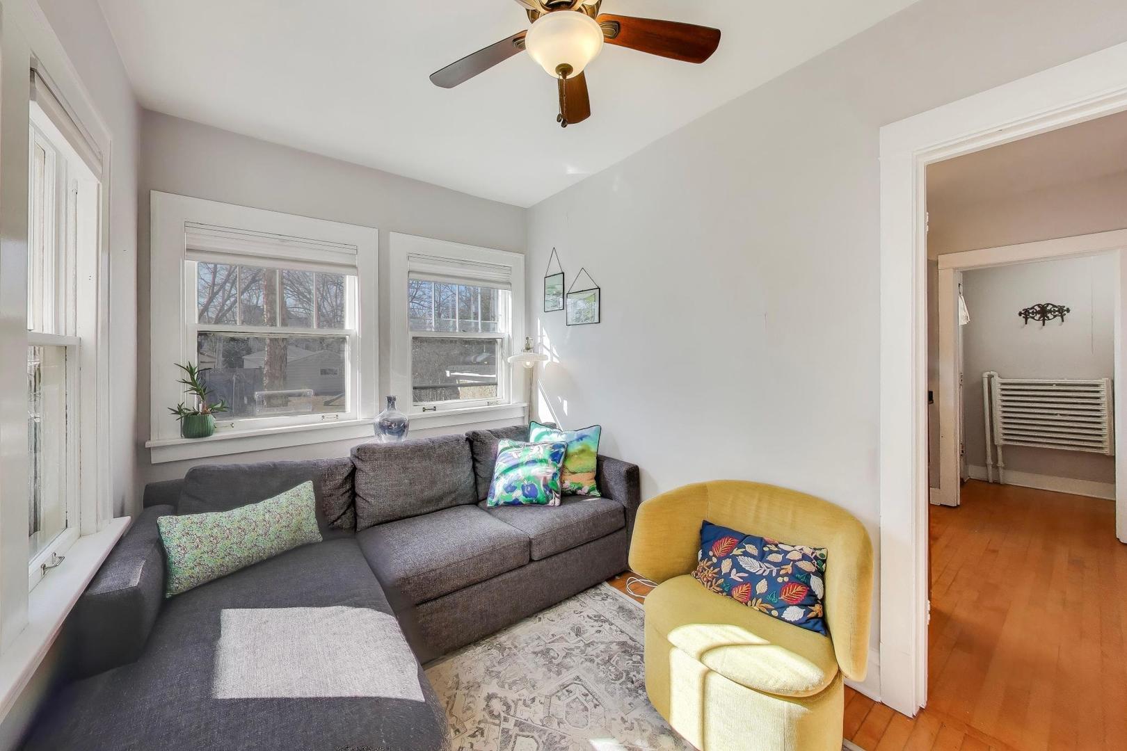 207 5th Street Wilmette, IL 60091 - Photo 13 of 30 a living room with furniture and a window