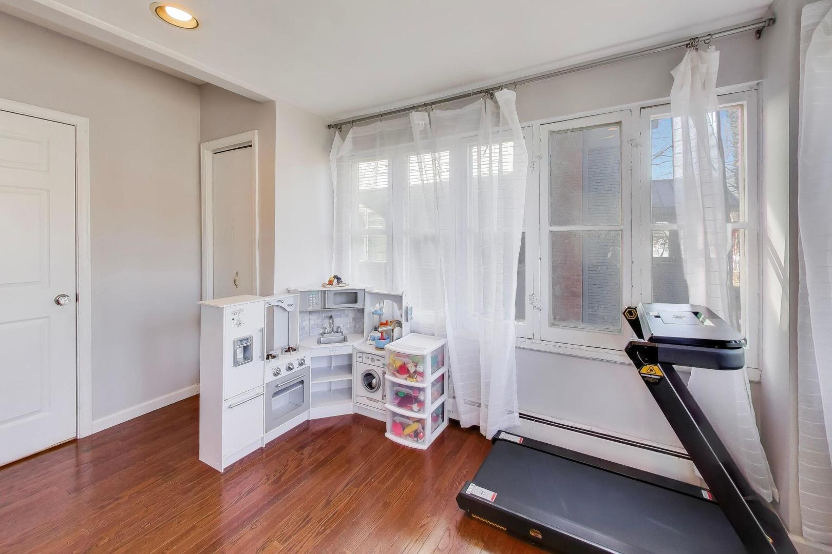 207 5th Street Wilmette, IL 60091 - Photo 16 of 30 a view of a room with gym equipment